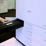 Should I load ink into a copy machine or replace the ink cartridges